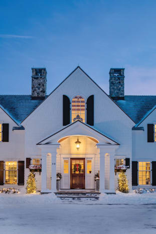 Symmetry creates a strong facade for this Revival house.