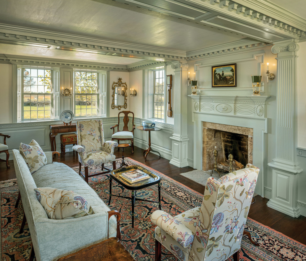 The new parlor in the main house of the Pendleton-Chapman Farm features hand-carved 18th-century-style paneling and decoration.