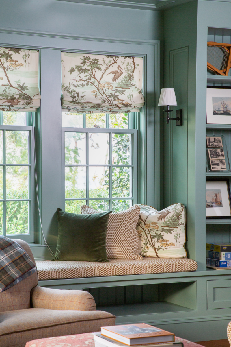 Window seats, such as this one in the study/office, create cozy corners.