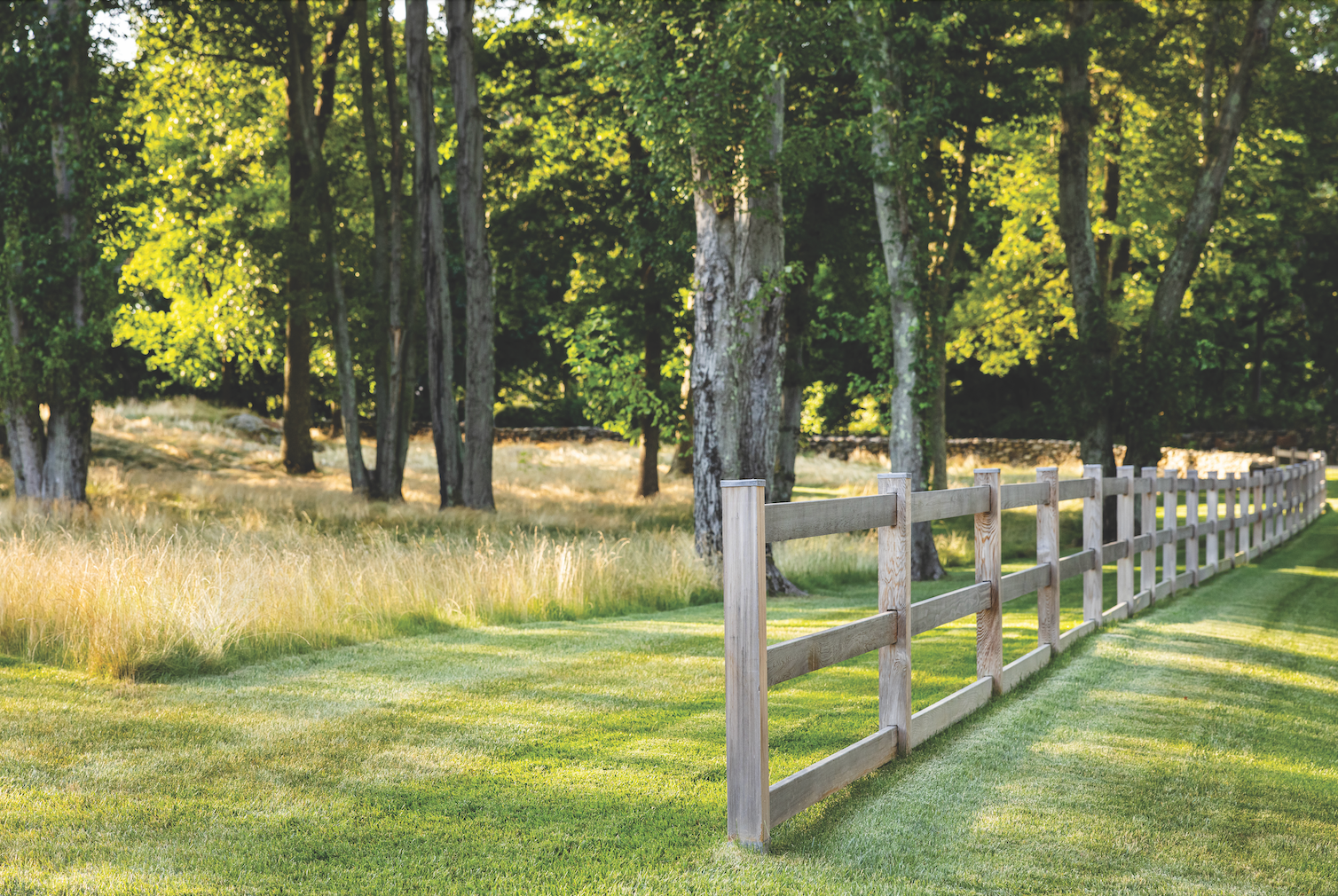 post and rail wooden fence historic new england farmhouse