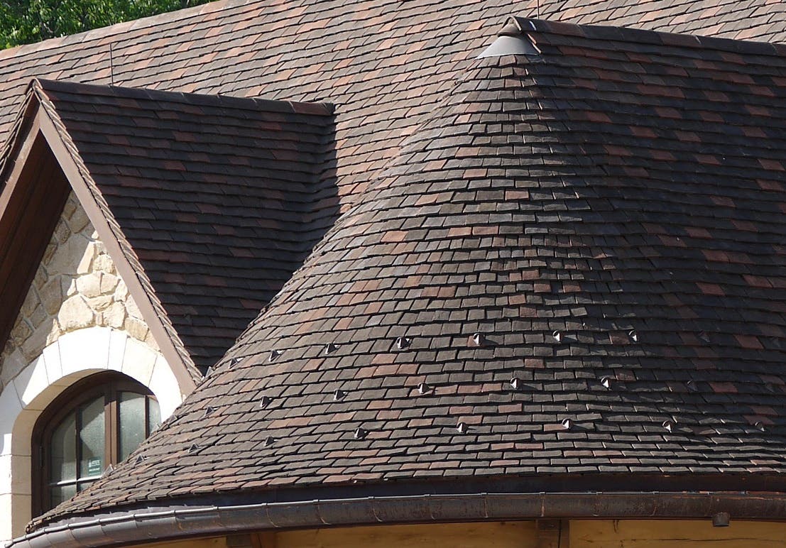 12-northern-roof-tiles-custom-english-shingle-tiles-made-for-round-hips-and-turrets.jpg